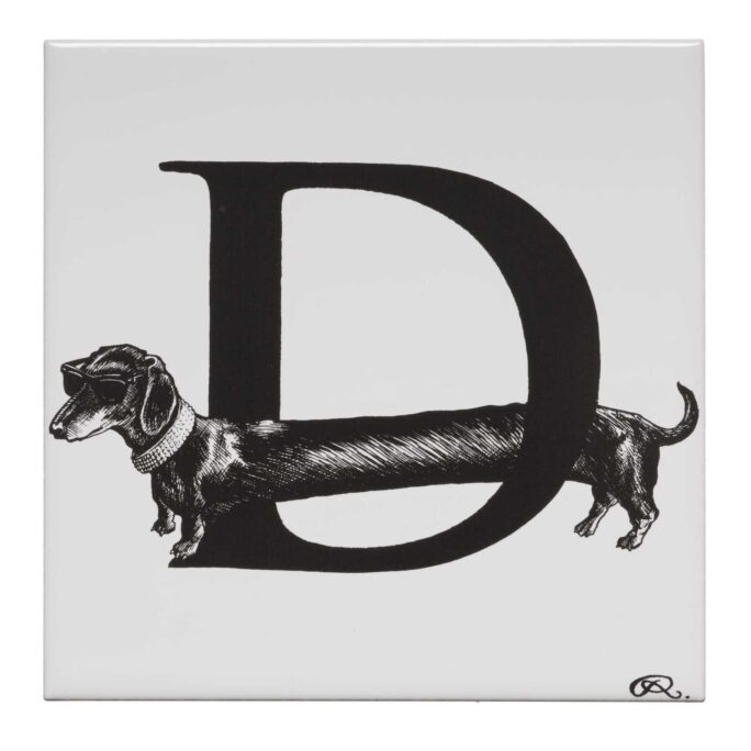 White ceramic Diamond Dog Tile. Each tile is hand decorated with a unique Intricate Ink Illustration telling each letter’s story.