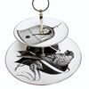 Bird sitting on the heart on one plate and cage with question mark on the other plate made from white bone china cake stand with 22 carat detailing