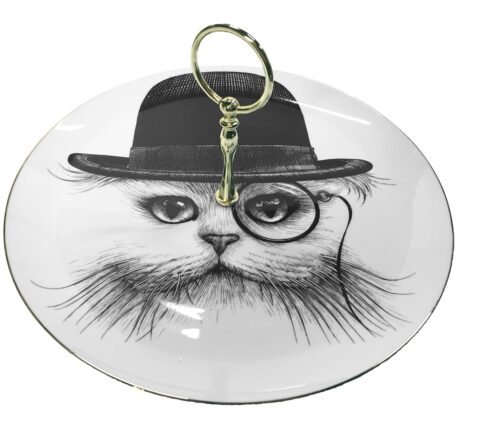 Cat wearing hat with monocle on the left eye in ink design on white fine bone china plate with 22 carat detailing
