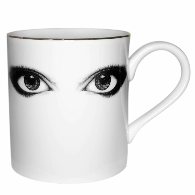 Two woman eyes looking straight at you. Done in black in on fine bone china mug
