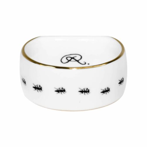 Image of an ants in a row in ink design on white fine bone china napkin ring with 22 carat detailing