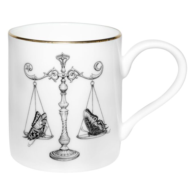 Scales with butterflies on each side in ink design on a fine bone china mug