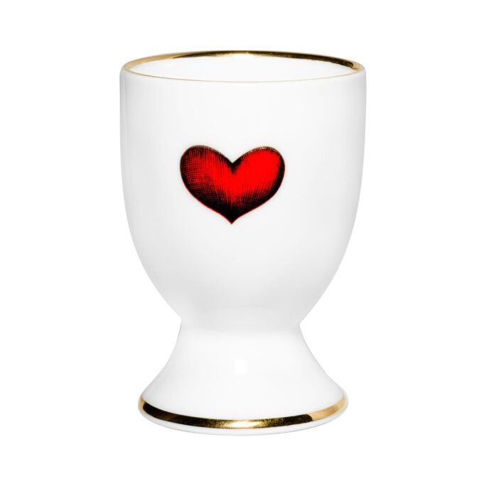 Red heart outlined in black in ink design on fine bone china egg put with 22 carat detailing