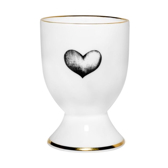 black heart in ink design on white fine bone china egg cup with 22 carat detailing on the rim