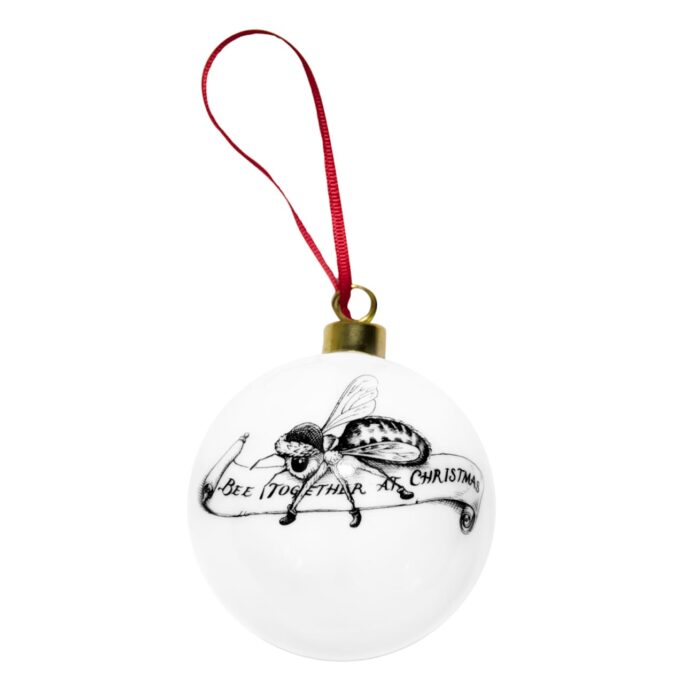 little bee wearing a Christmas hat on top of the paper that says "be together at Christmas" in ink design on white fine bone china bauble with red ribbon